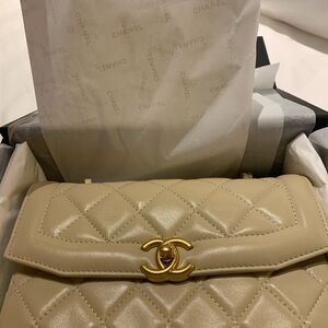 Absolutely stunning nude authentic, rare nude Chanel purse, with zipper pockets